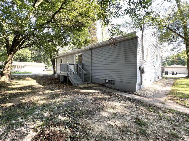 5174 Independence Avenue Portage, IN 46368 - Photo 26 of 26 a view of a house with a yard