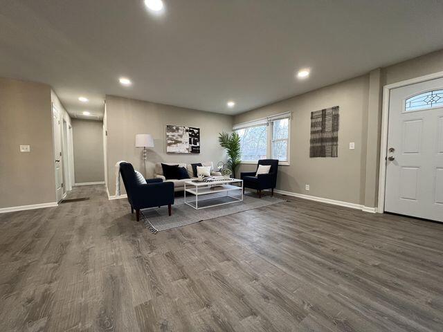 5174 Independence Avenue Portage, IN 46368 - Photo 4 of 26 a living room with furniture and a wooden floor