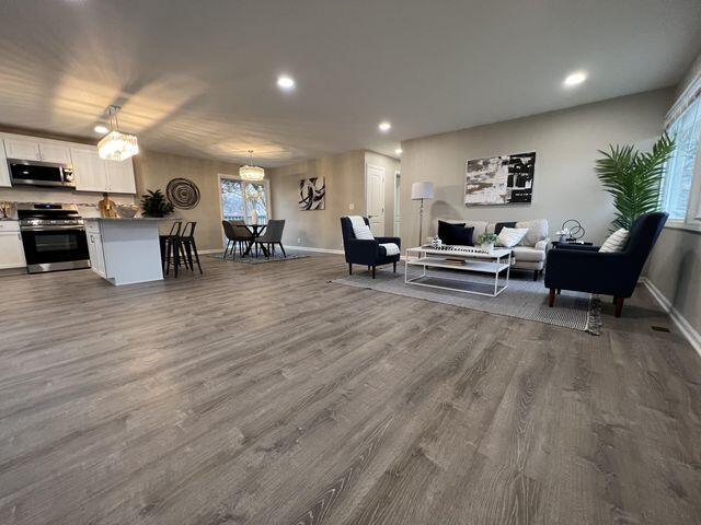5174 Independence Avenue Portage, IN 46368 - Photo 5 of 26 a living room with furniture and kitchen view