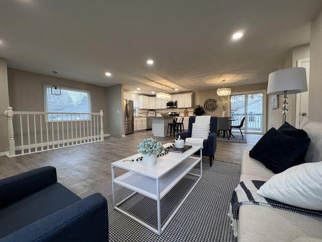 5174 Independence Avenue Portage, IN 46368 - Photo 6 of 26 a living room with furniture and a wooden floor