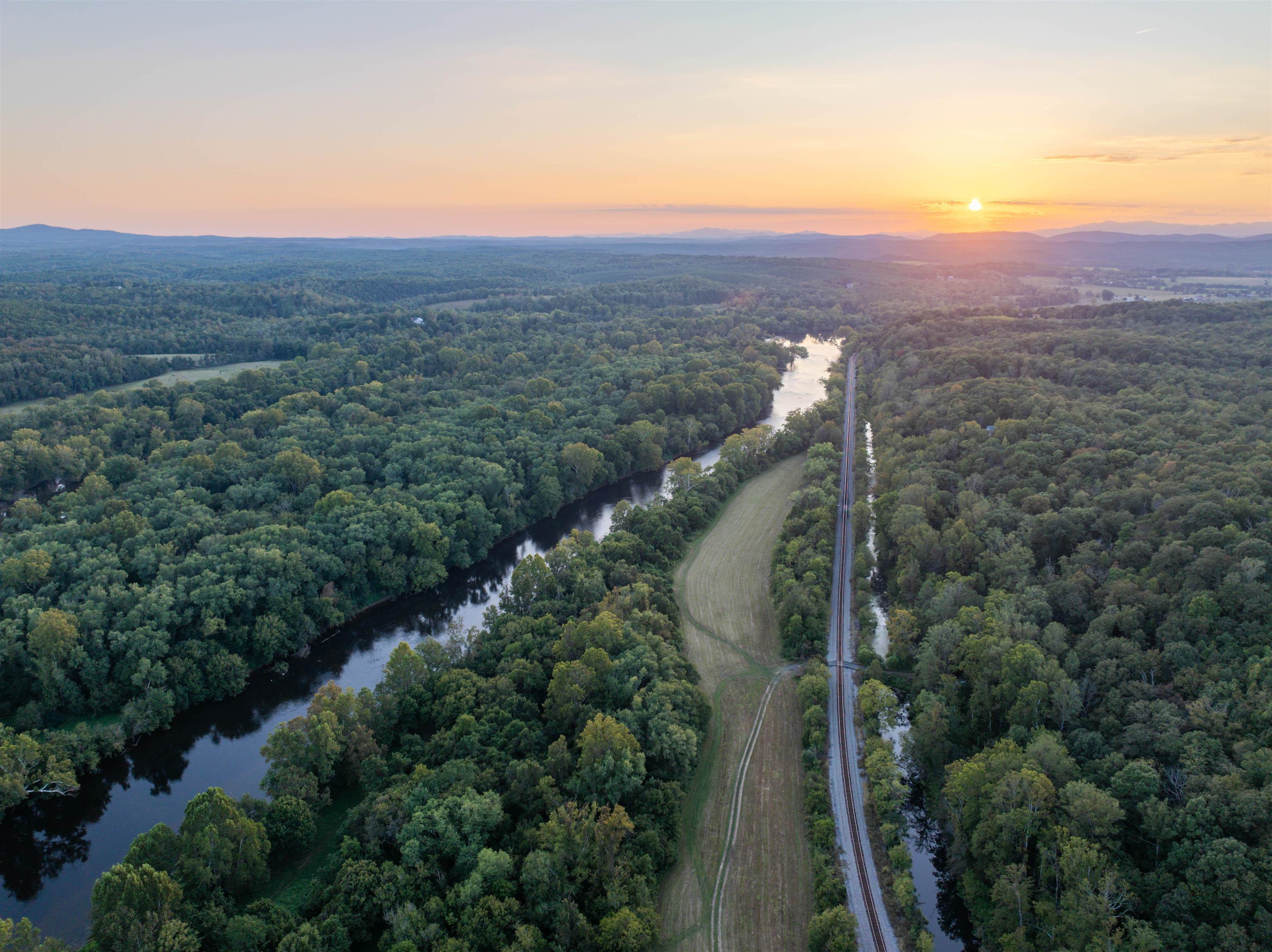 Tbd Jones Overlook Howardsville, VA 24562 - Photo 68 of 74 a view of a green field with mountains in the background