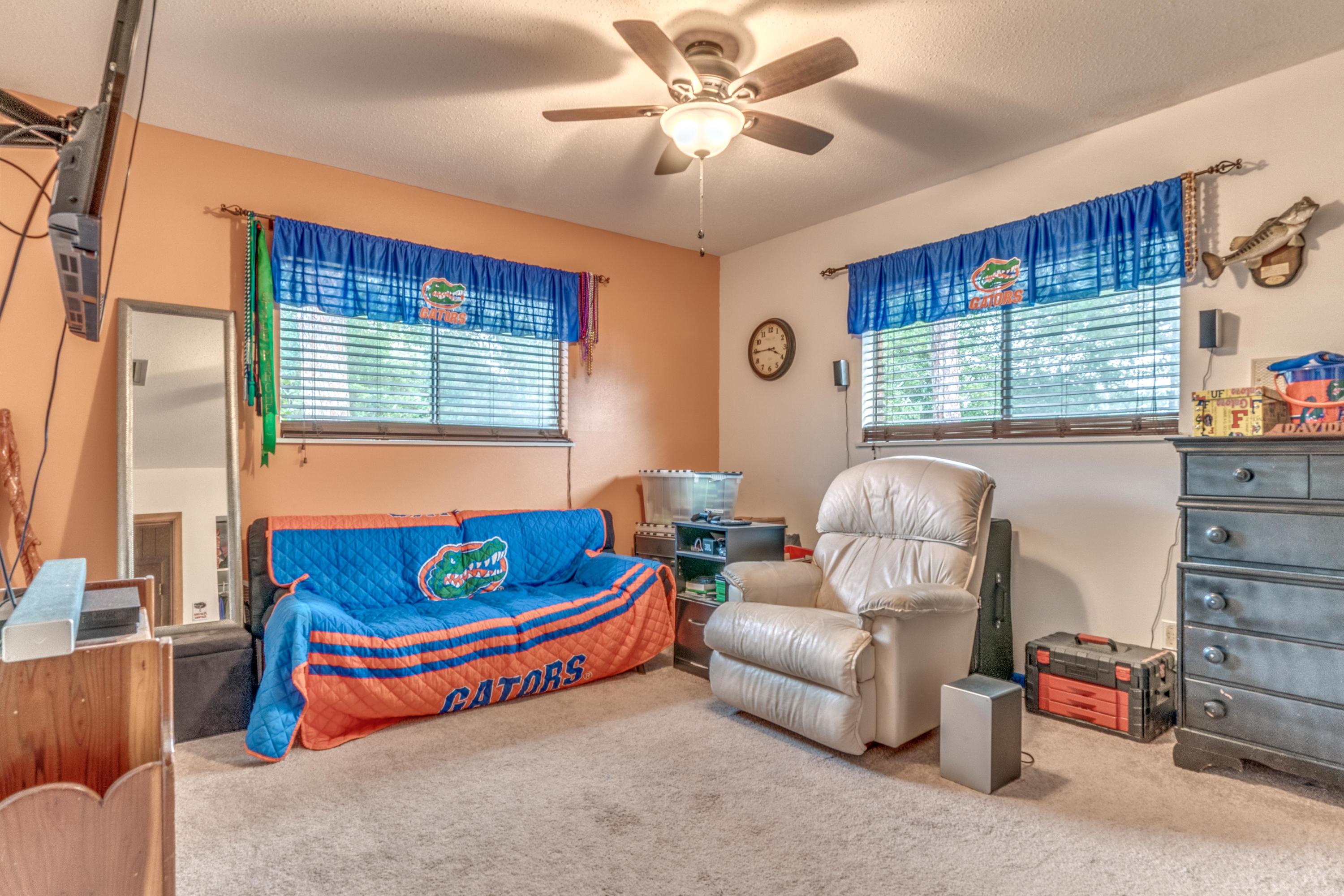 837 Cardinal Street Fort Walton Beach, FL 32547 - Photo 15 of 24 a living room with furniture and a window