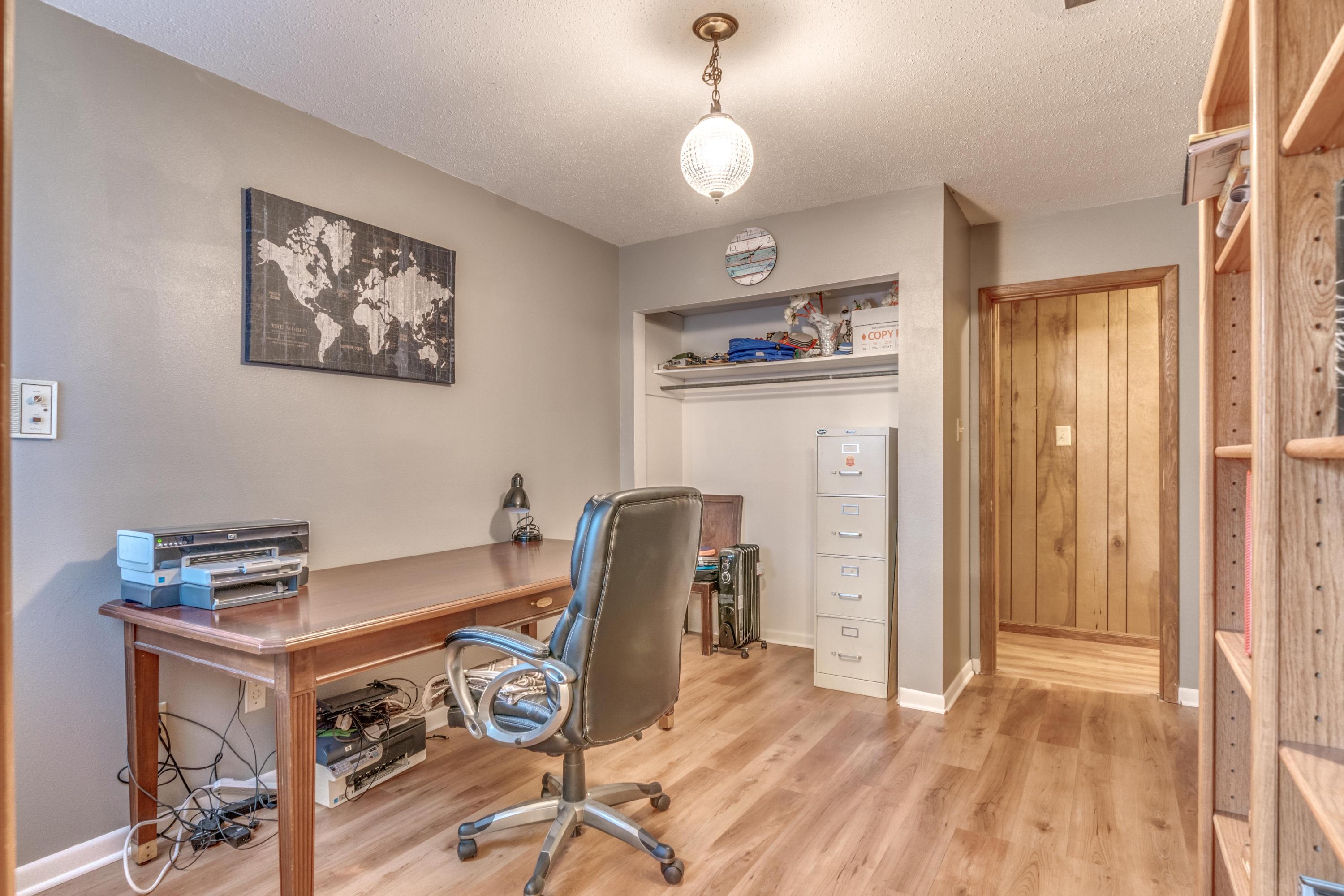 837 Cardinal Street Fort Walton Beach, FL 32547 - Photo 17 of 24 a view of a workspace with furniture and a window
