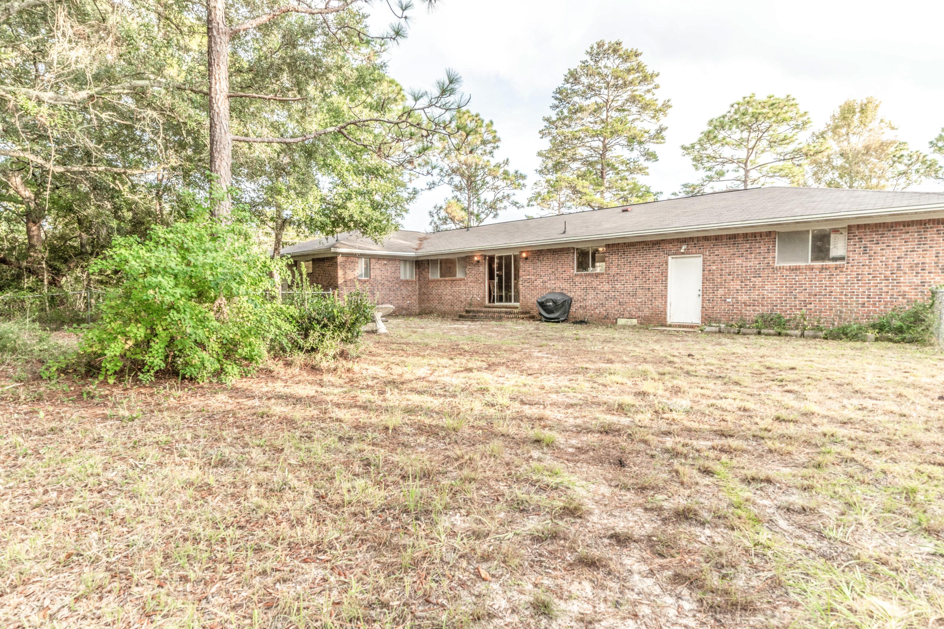 837 Cardinal Street Fort Walton Beach, FL 32547 - Photo 22 of 24 a house view with a outdoor space