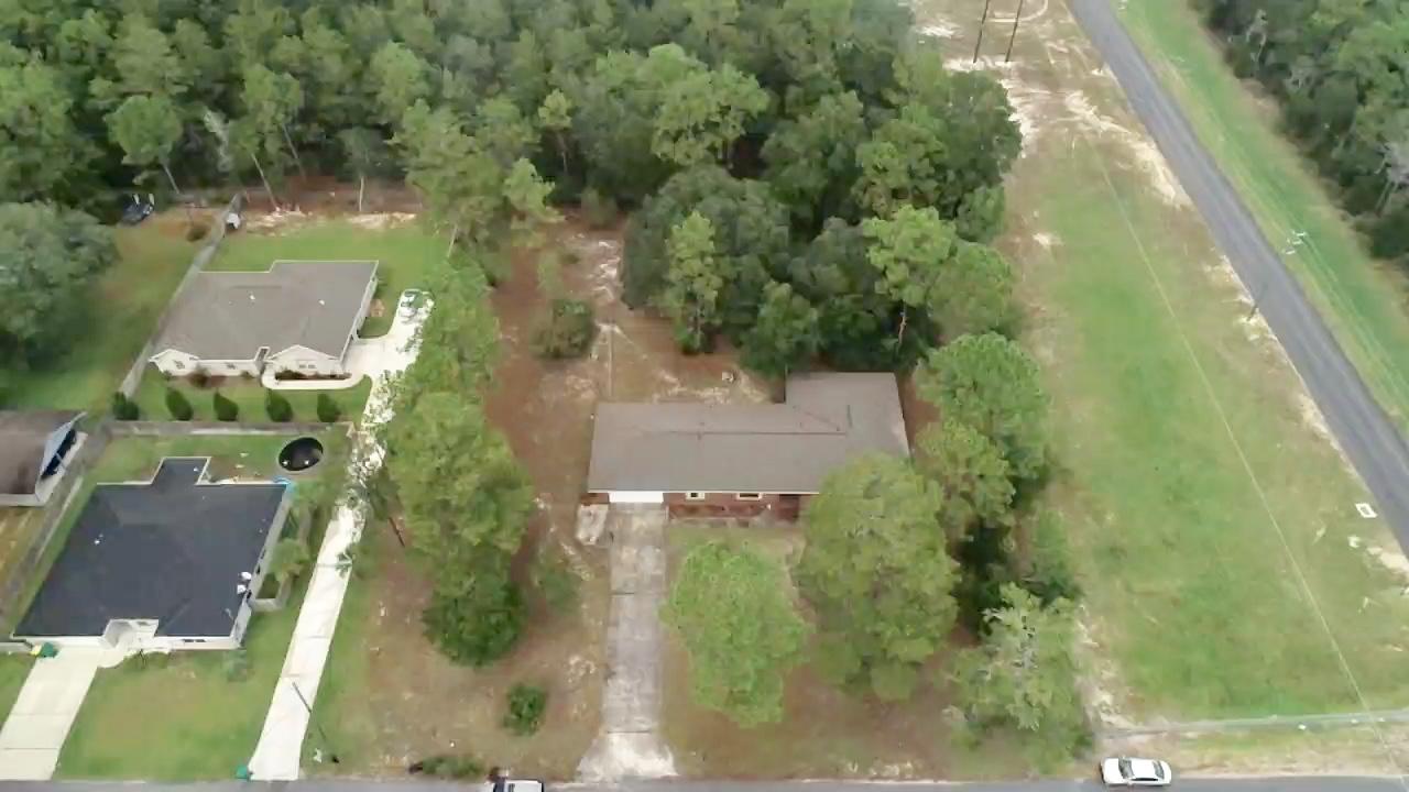 837 Cardinal Street Fort Walton Beach, FL 32547 - Photo 23 of 24 an aerial view of a house with a yard