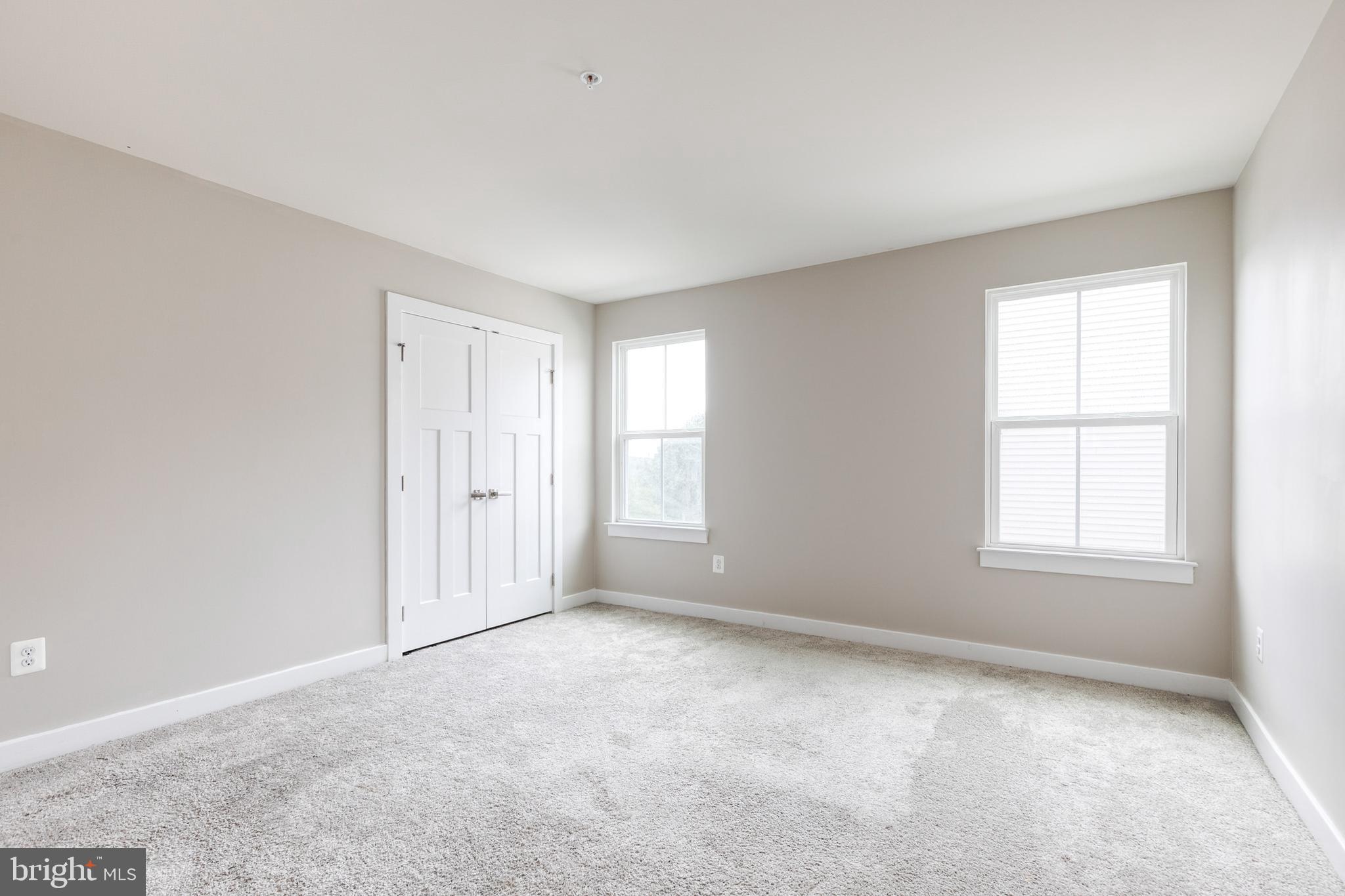 6003 Valentine Way Hanover, MD 21076 - Photo 42 of 52 an empty room with windows