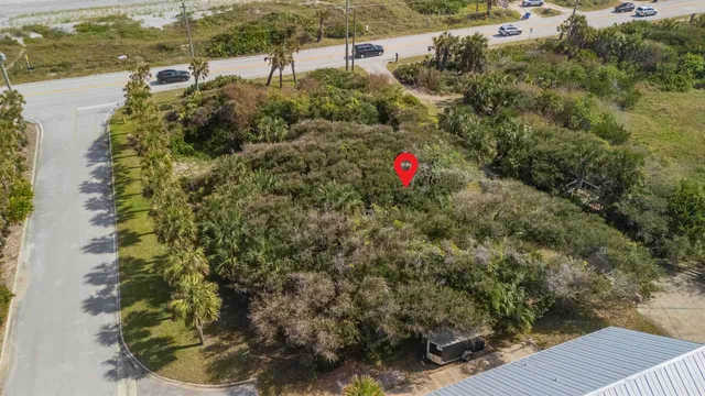a view of a houses with a yard