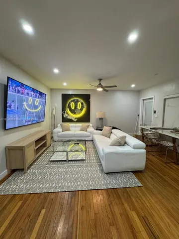 a living room with couch and a table