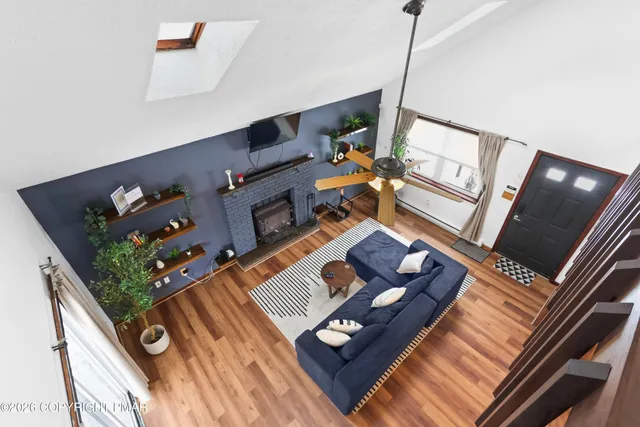 a living room with furniture and a book