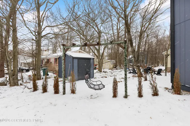 a view of snow on the side of road