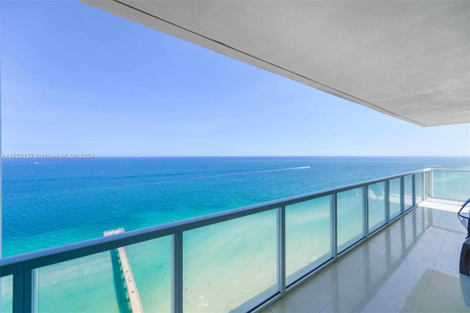 a view of balcony with ocean view