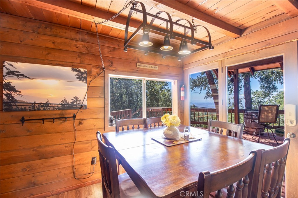 24387 Rocky Point Road Idyllwild, CA 92549 - Photo 29 of 29 a dining room with furniture window and outside view