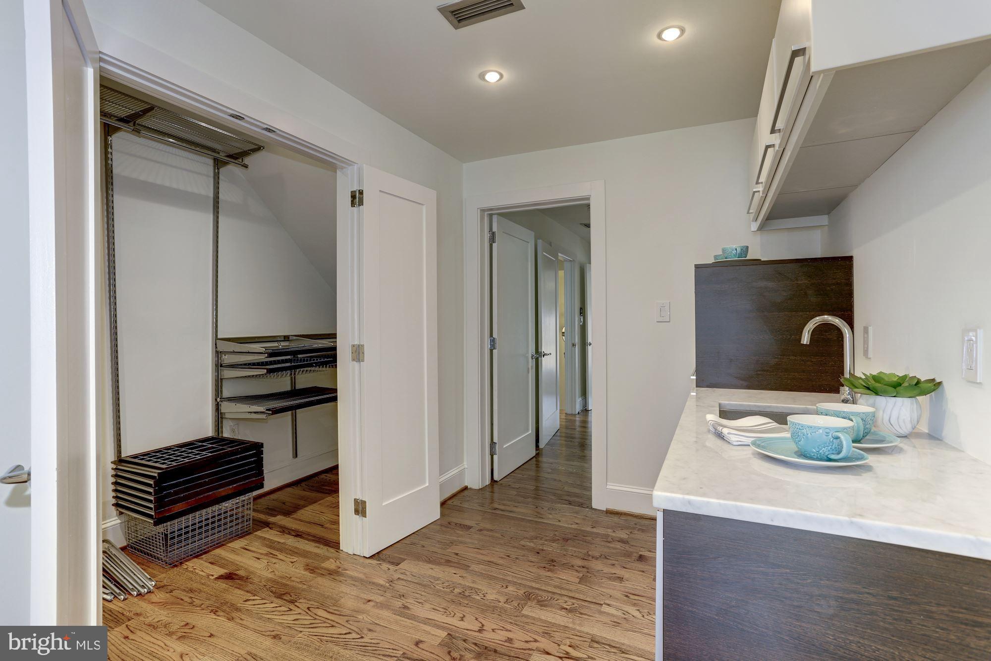 420 Ridge Street Northwest Washington, DC 20001 - Photo 27 of 56 Incl large double door closet w/ ELFA throughout