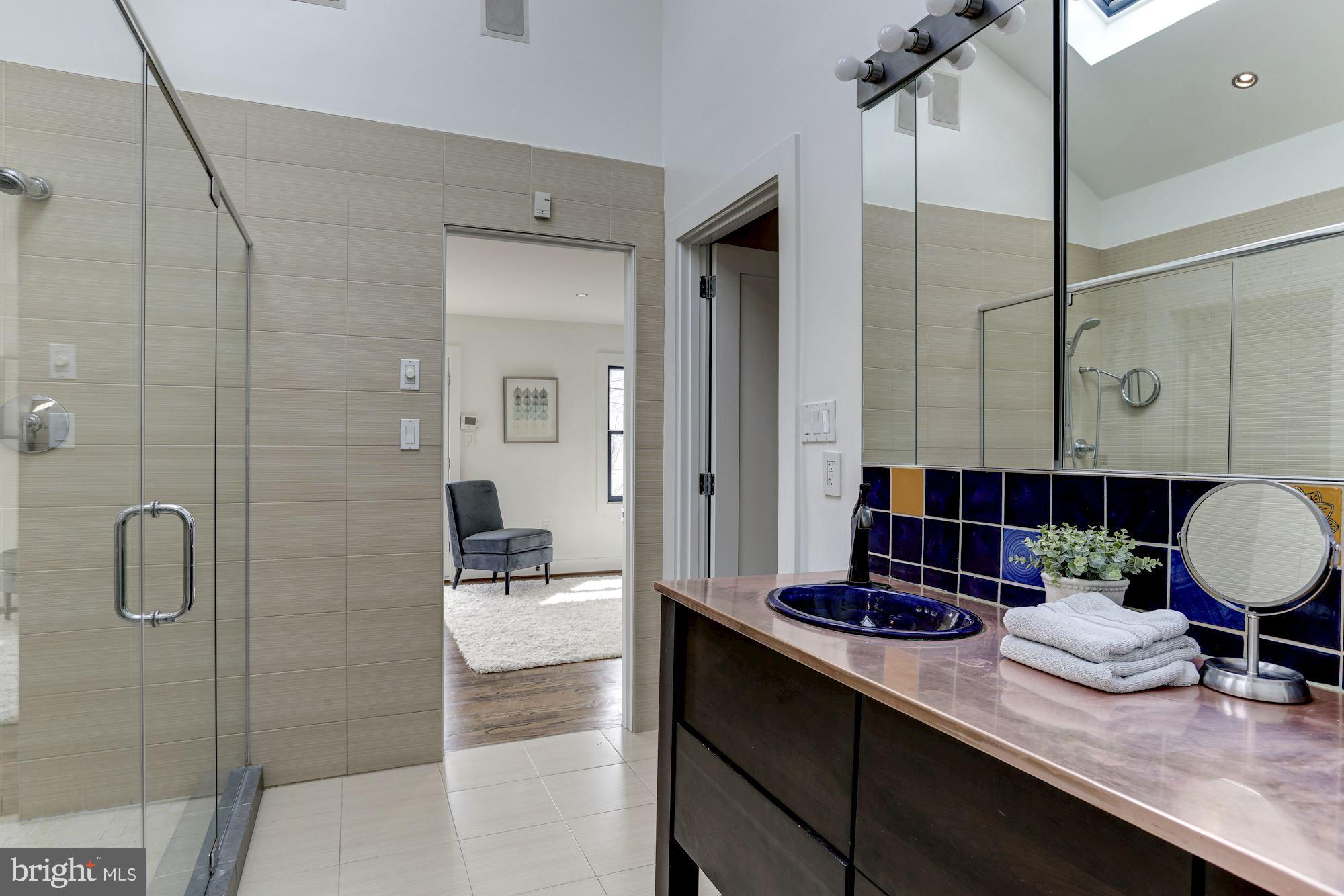 420 Ridge Street Northwest Washington, DC 20001 - Photo 34 of 56 En suite Primary Bath with double vanity.