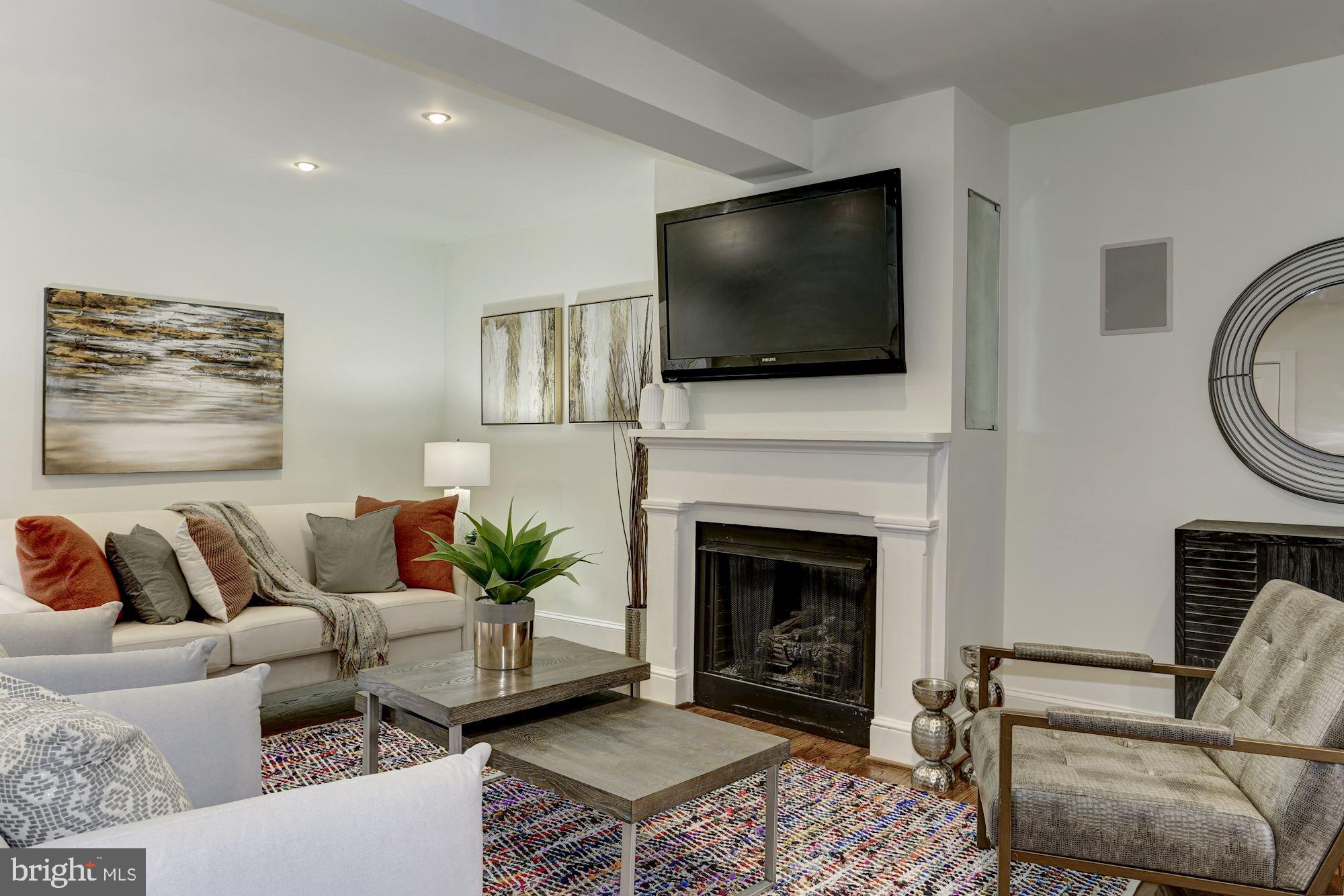 420 Ridge Street Northwest Washington, DC 20001 - Photo 7 of 56 Gas Fireplace and TV conveys.