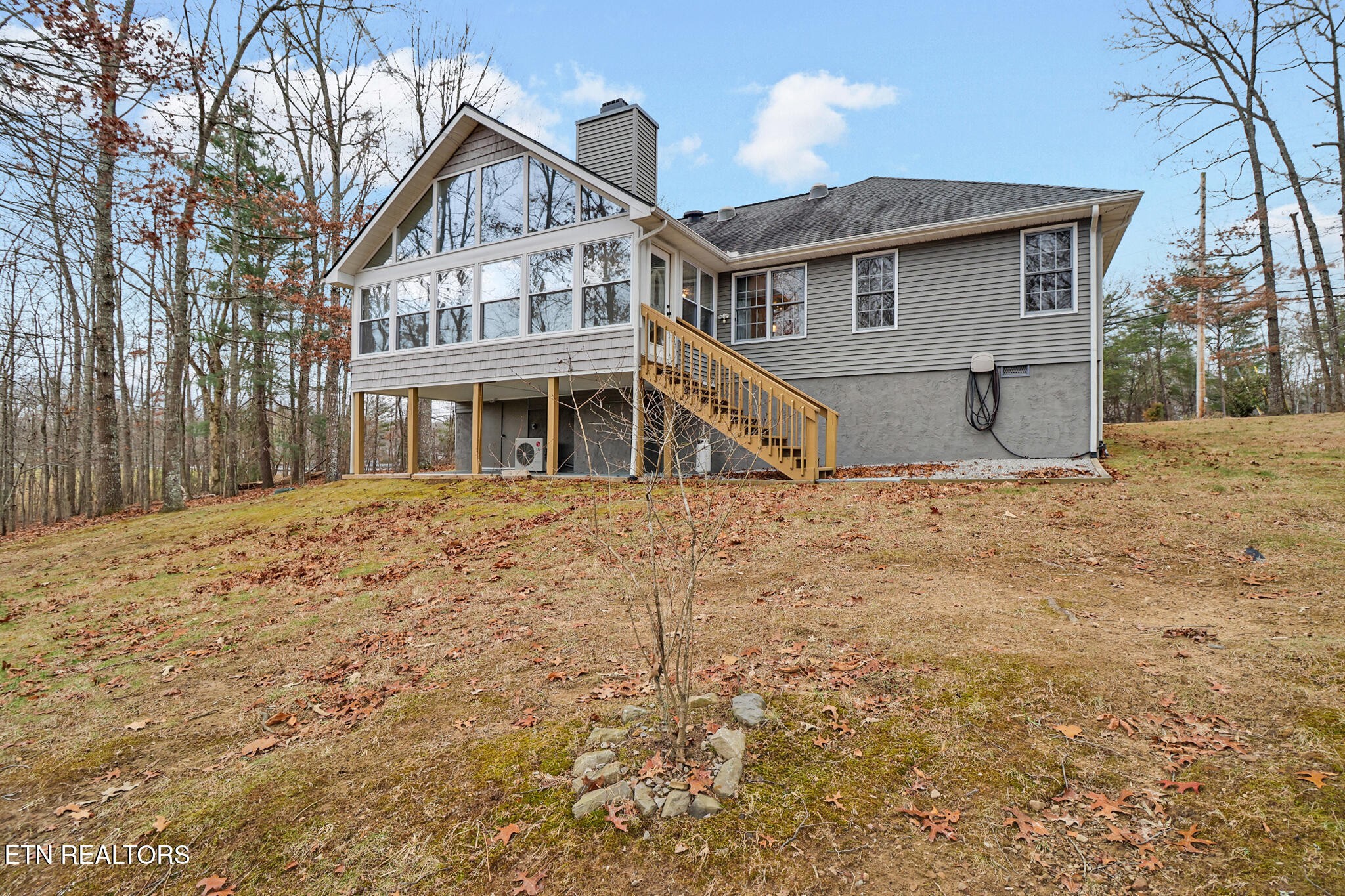 121 St George Drive Crossville, TN 38558 - Photo 35 of 37 a front view of a house with a yard