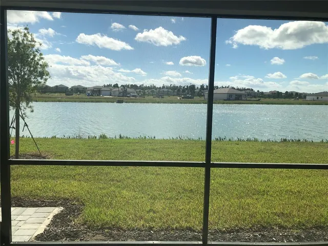 a view of a lake from a yard