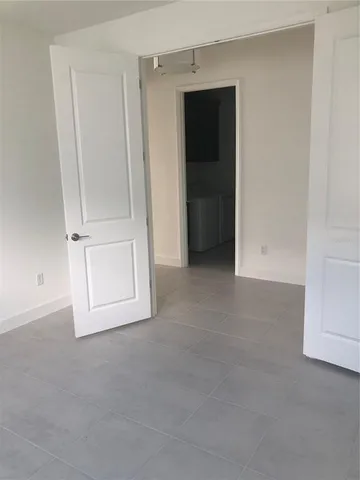 a view of hallway with window