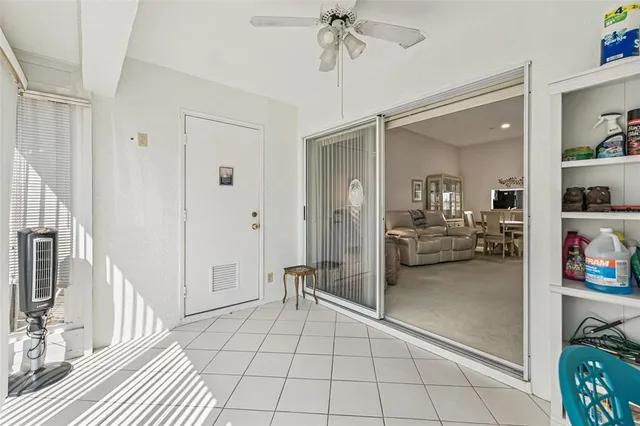 a view of a hallway view with staircase