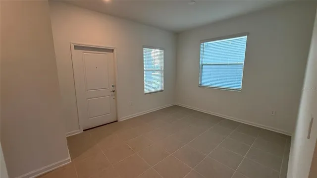 an empty room with windows