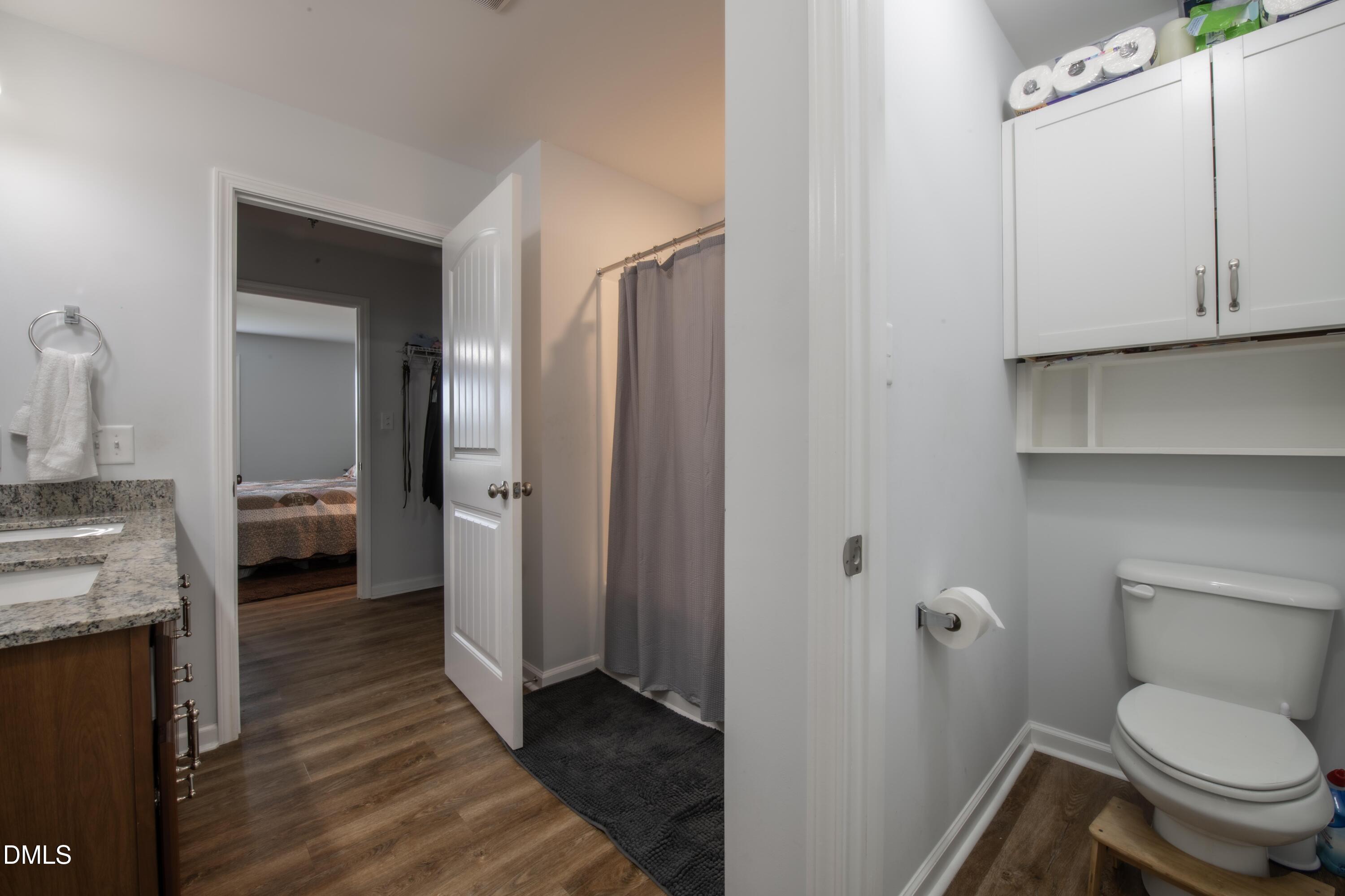130 Hardy Road Wendell, NC 27591 - Photo 20 of 34 a bathroom with a toilet and a sink