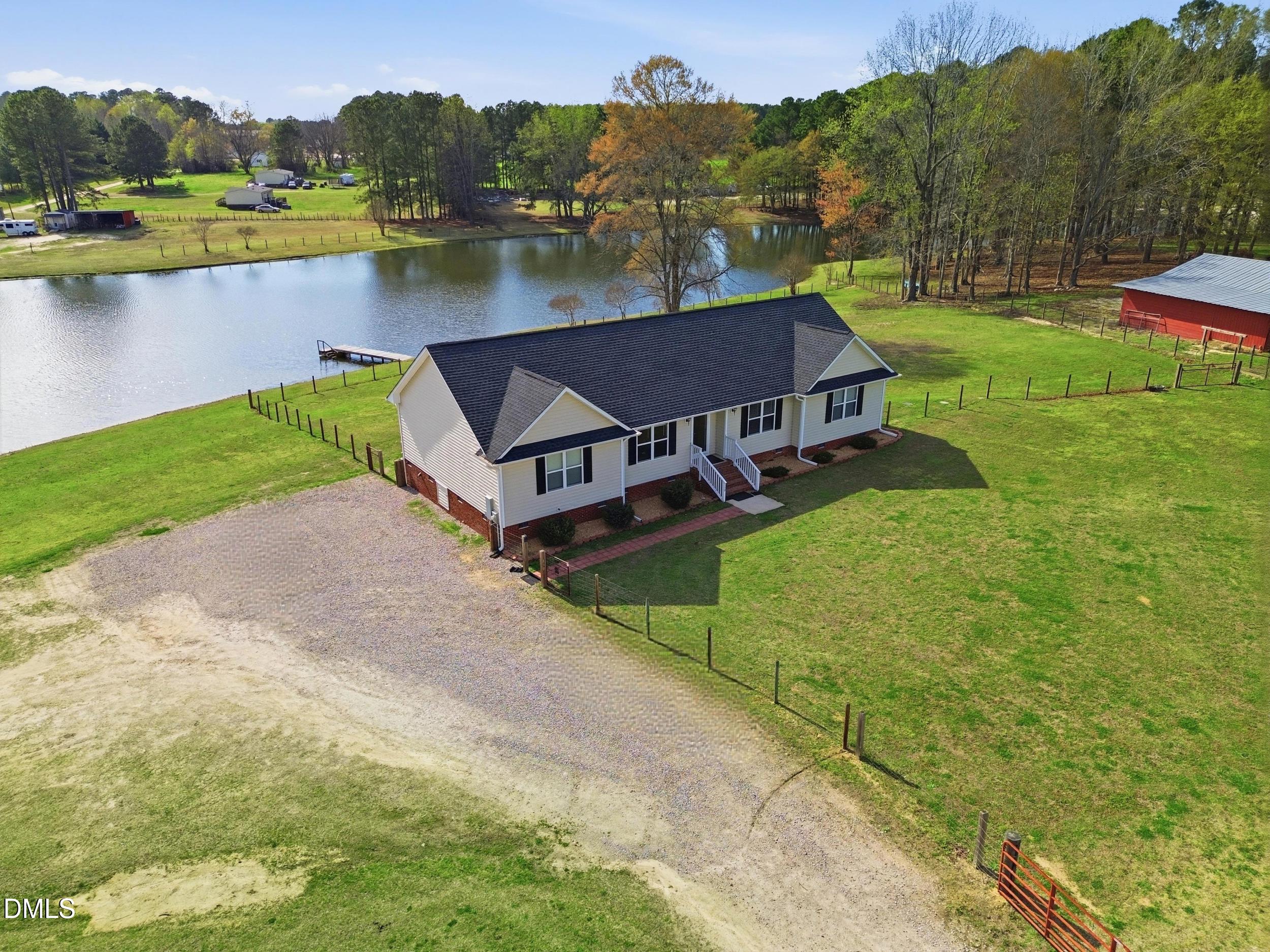 130 Hardy Road Wendell, NC 27591 - Photo 2 of 34 a aerial view of a house with pool and a yard