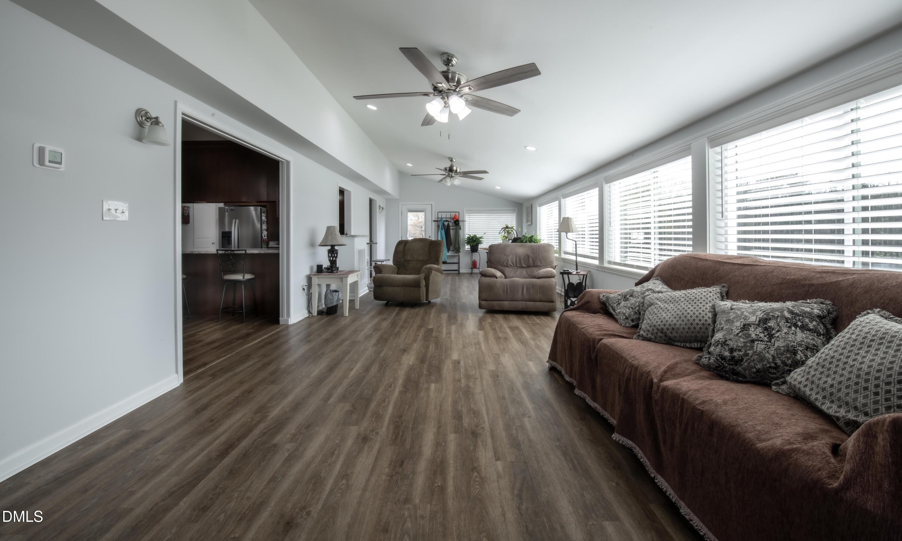 130 Hardy Road Wendell, NC 27591 - Photo 29 of 34 a living room with furniture and wooden floor