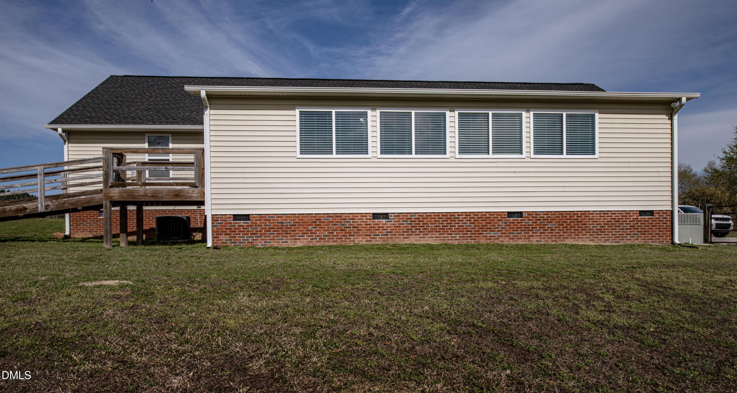 130 Hardy Road Wendell, NC 27591 - Photo 32 of 34 a front view of a house with a garden