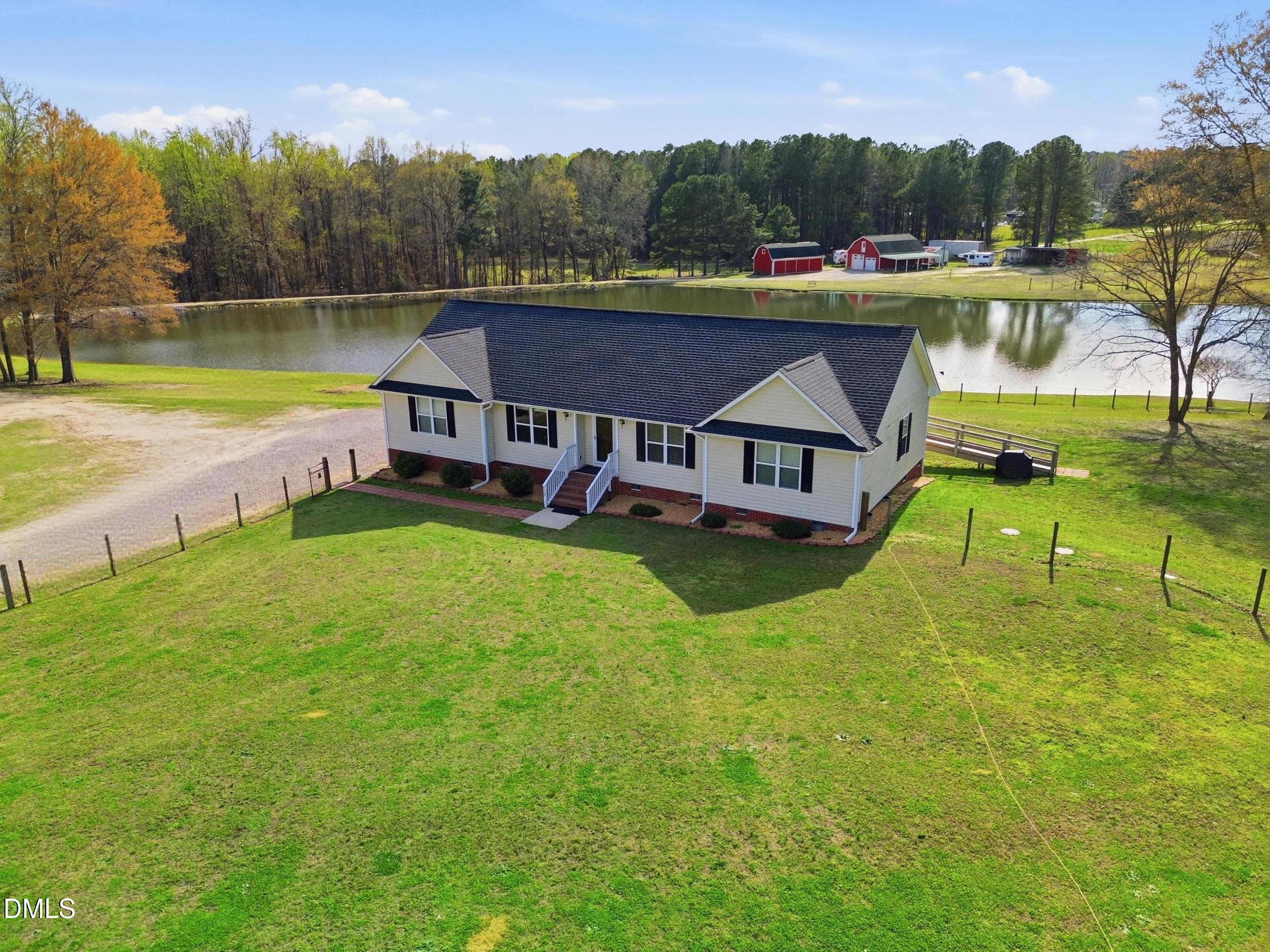130 Hardy Road Wendell, NC 27591 - Photo 5 of 34 an aerial view of a house with swimming pool and a yard