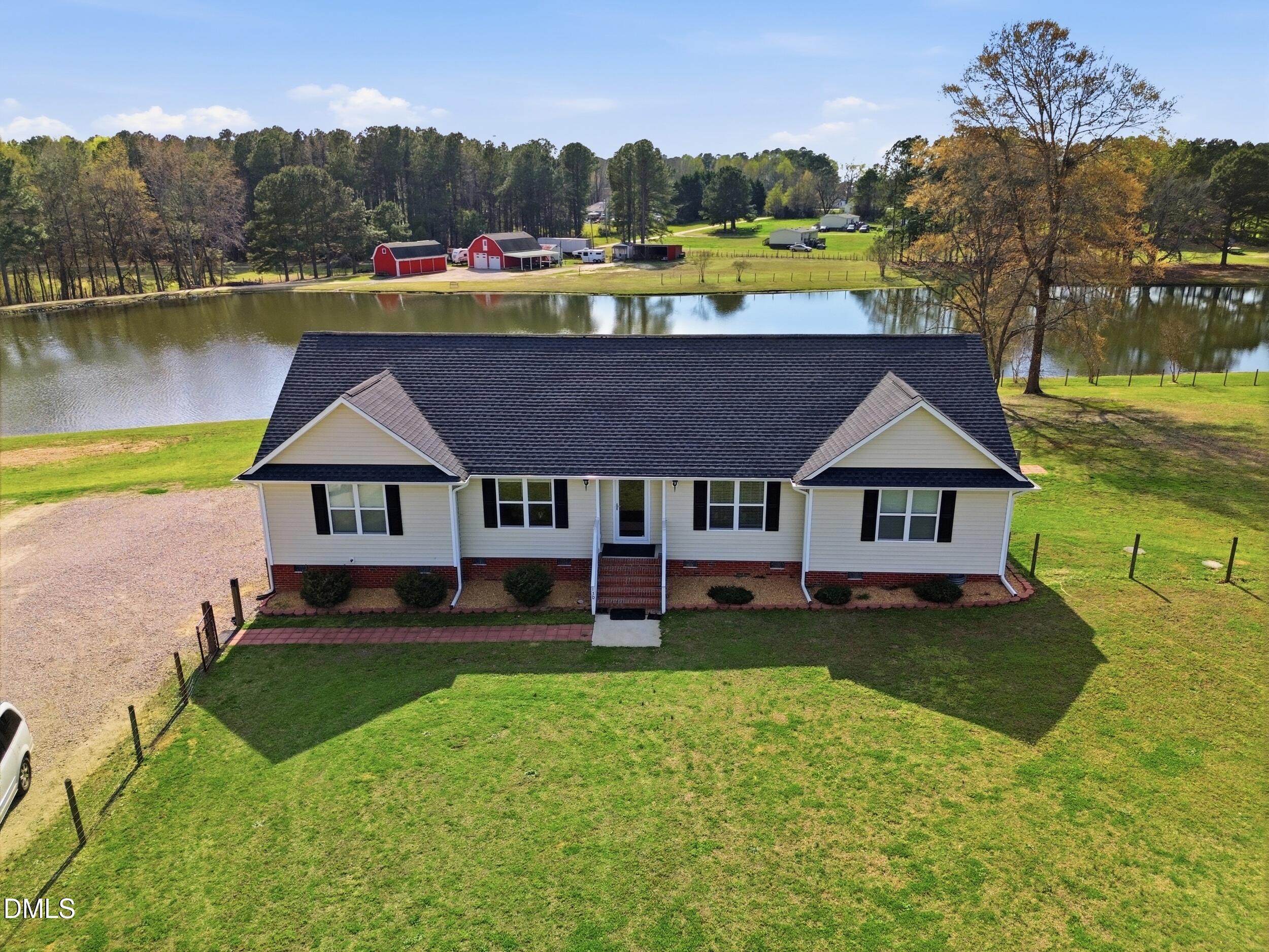 130 Hardy Road Wendell, NC 27591 - Photo 7 of 34 an aerial view of a house with garden space and a house