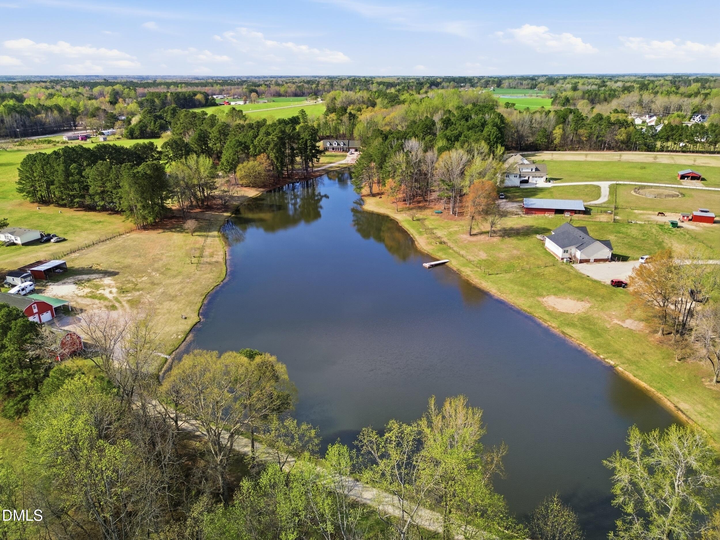 130 Hardy Road Wendell, NC 27591 - Photo 8 of 34 an aerial view of residential houses with outdoor space and lake view