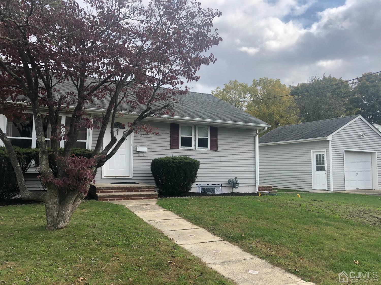 2 High Point Road East Brunswick, NJ 08816 - Photo 1 of 36 a front view of house with yard and green space