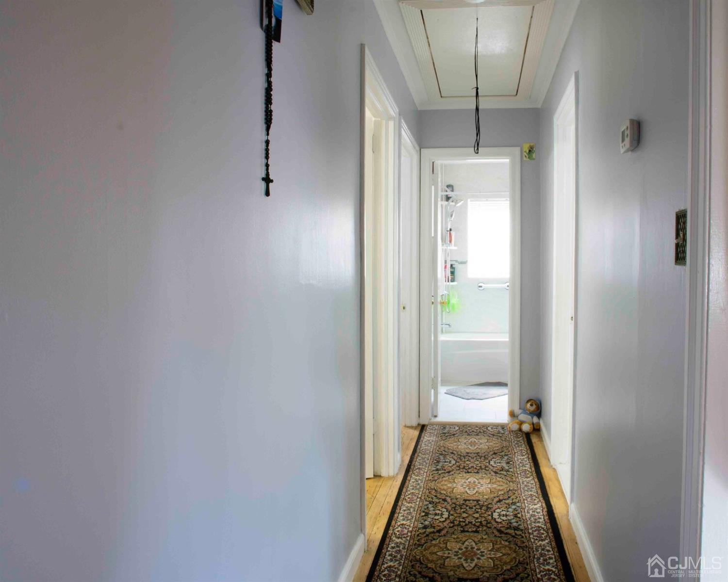 2 High Point Road East Brunswick, NJ 08816 - Photo 22 of 36 a view of a livingroom from a hallway