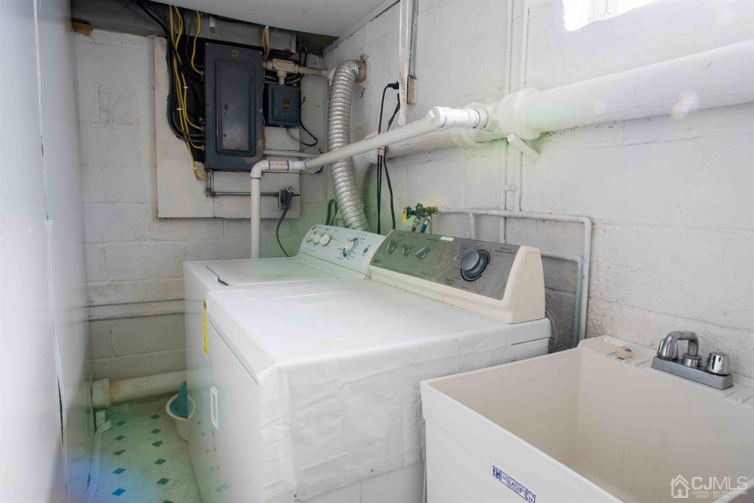 2 High Point Road East Brunswick, NJ 08816 - Photo 23 of 36 a utility room with dryer and washer