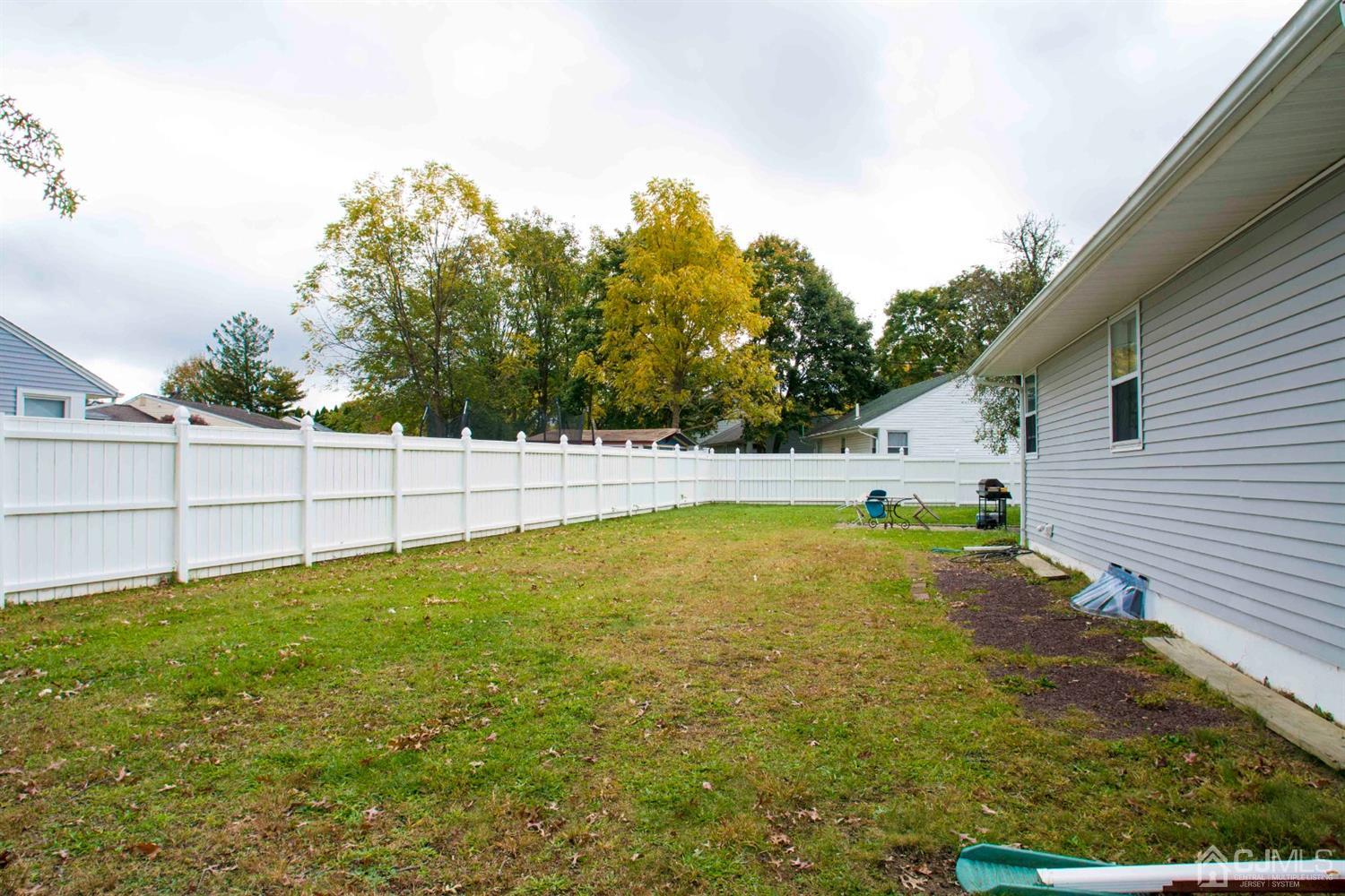 2 High Point Road East Brunswick, NJ 08816 - Photo 33 of 36 a view of a backyard with white fence