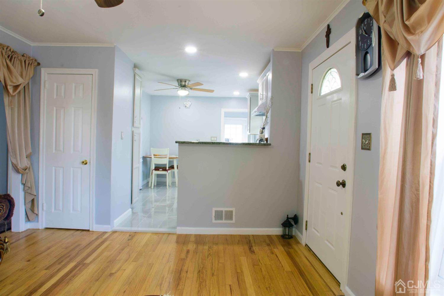 2 High Point Road East Brunswick, NJ 08816 - Photo 10 of 36 a view of a livingroom with wooden floor