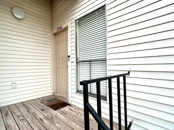 a view of wooden balcony and floor
