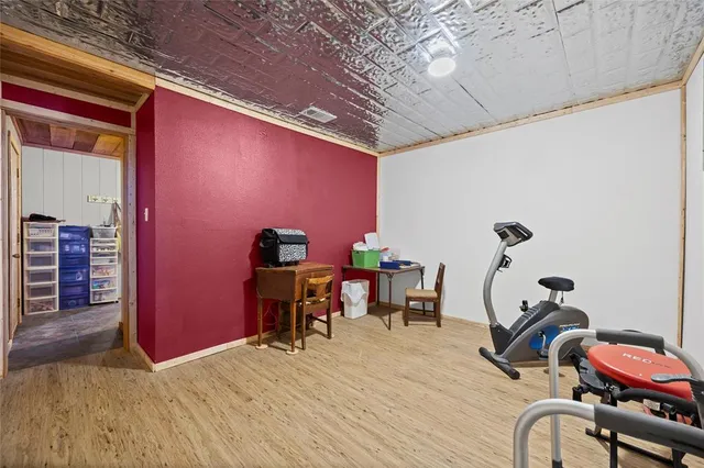 a room with furniture and musical instruments