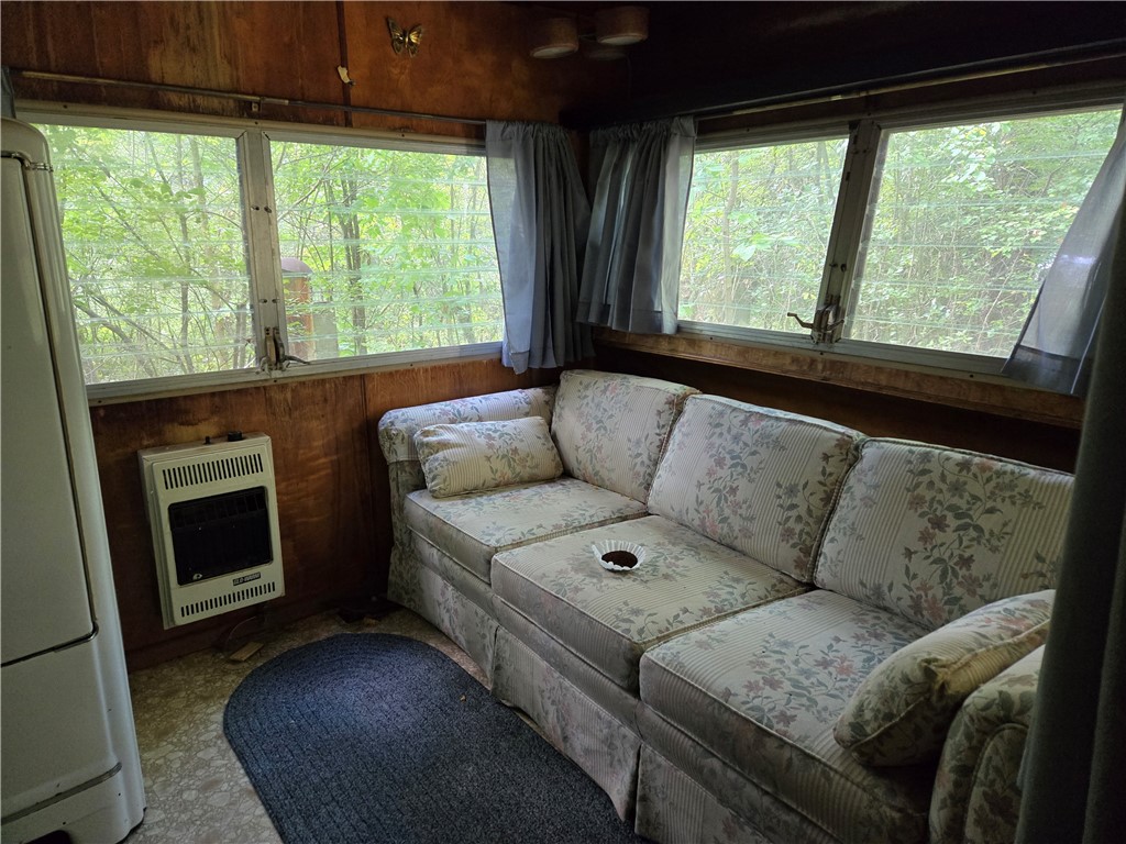 4175 Pre Emption Road Tyrone, NY 14891 - Photo 13 of 19 Cozy Sitting Area with Large Windows and Built-In