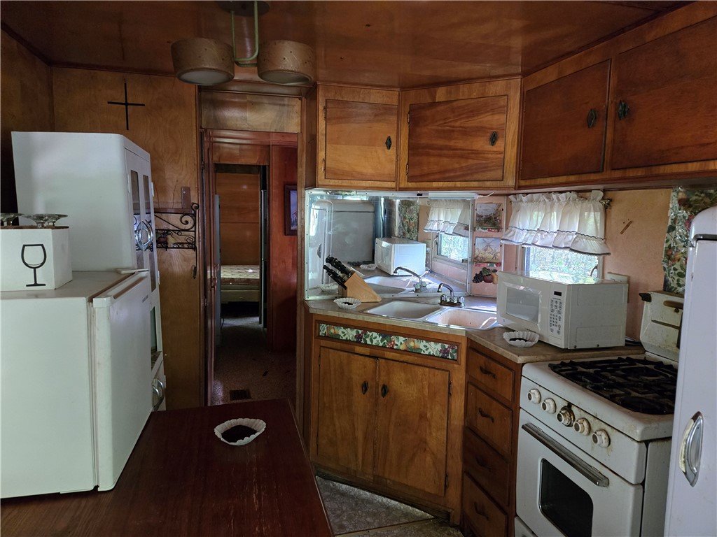 4175 Pre Emption Road Tyrone, NY 14891 - Photo 14 of 19 Functional Kitchen with Rustic Wood Cabinetry — Eq