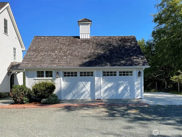 a view of a house with a street