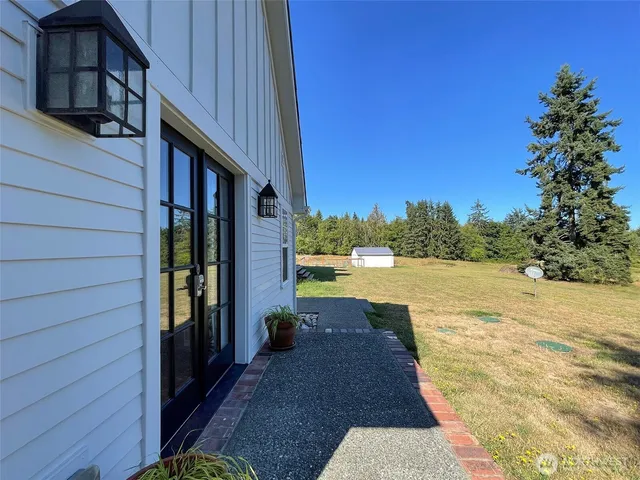 a view of swimming pool with a patio