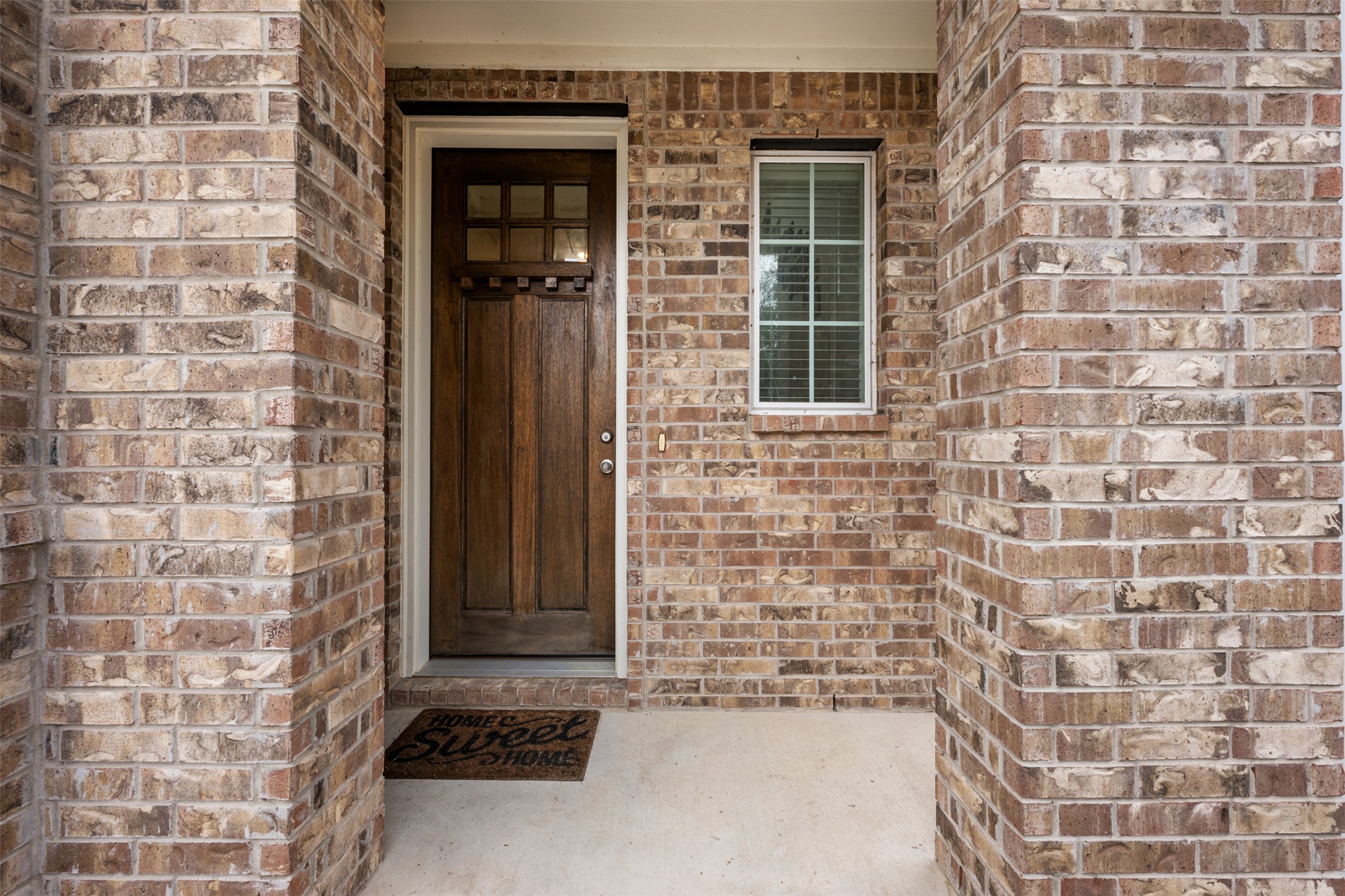 8204 Prairie Rye Drive Lago Vista, TX 78645 - Photo 4 of 39 Porch with solid wood Arts and Crafts door.