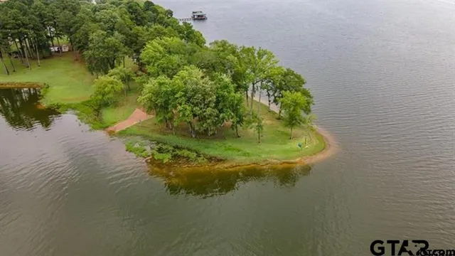 a water view with table and chairs