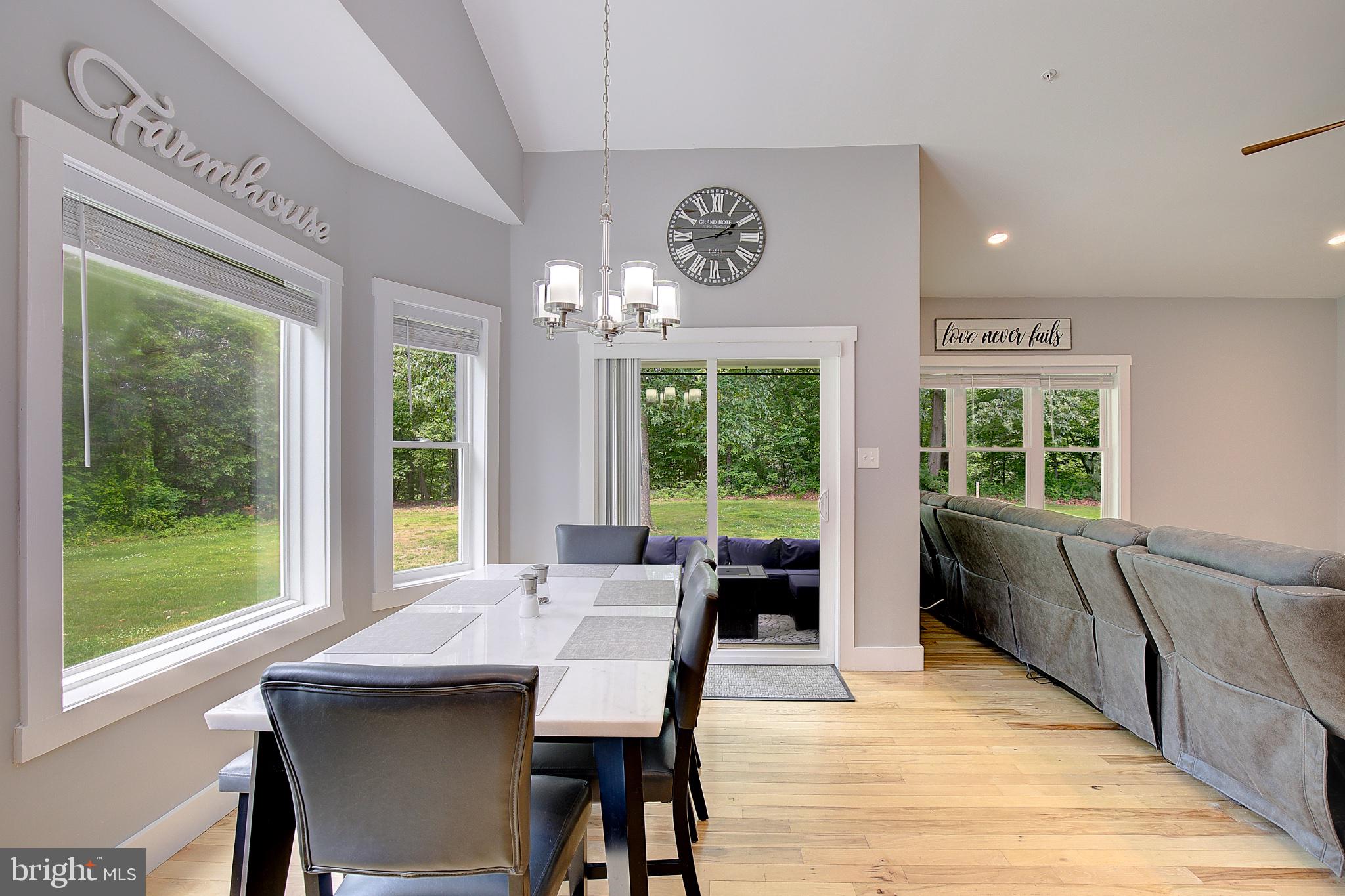 3081 Soper Road Huntingtown, MD 20639 - Photo 18 of 49 Bright, airy dining space with views.