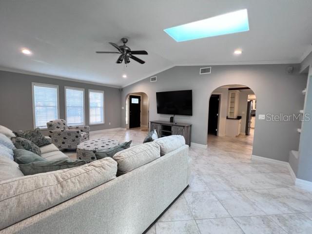 681 Verona Street Port Charlotte, FL 33948 - Photo 11 of 40 a living room with furniture and a flat screen tv