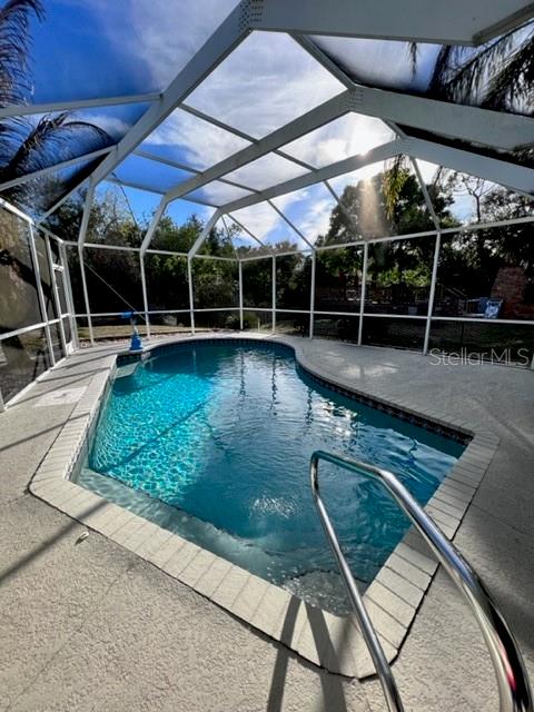 681 Verona Street Port Charlotte, FL 33948 - Photo 18 of 40 a view of a backyard with seating area