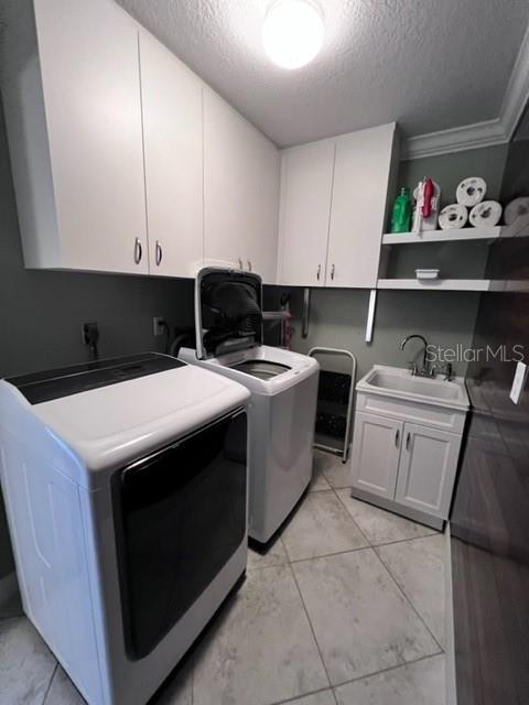 681 Verona Street Port Charlotte, FL 33948 - Photo 25 of 40 a utility room with washer and dryer