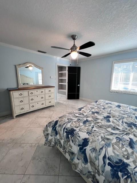 681 Verona Street Port Charlotte, FL 33948 - Photo 30 of 40 a bed room with a bed and a television