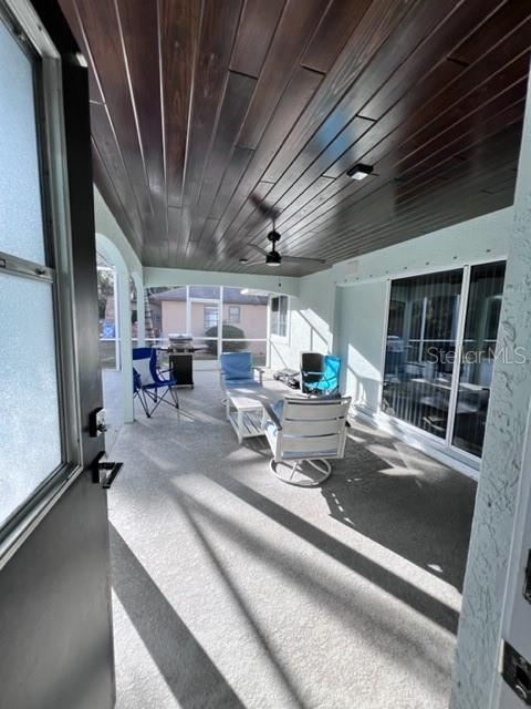 681 Verona Street Port Charlotte, FL 33948 - Photo 3 of 40 a lobby with furniture and a potted plant